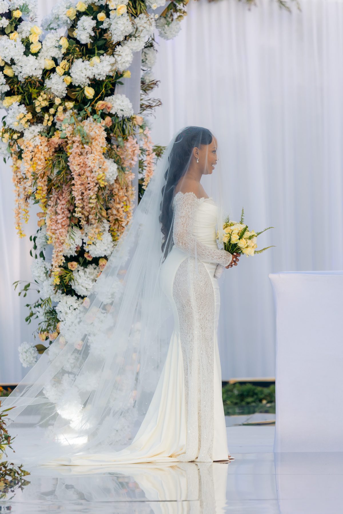 Ali & Dr. Lucy wedding in Tanga, Tanzania, by Kevins Events — bridal portrait with cathedral veil