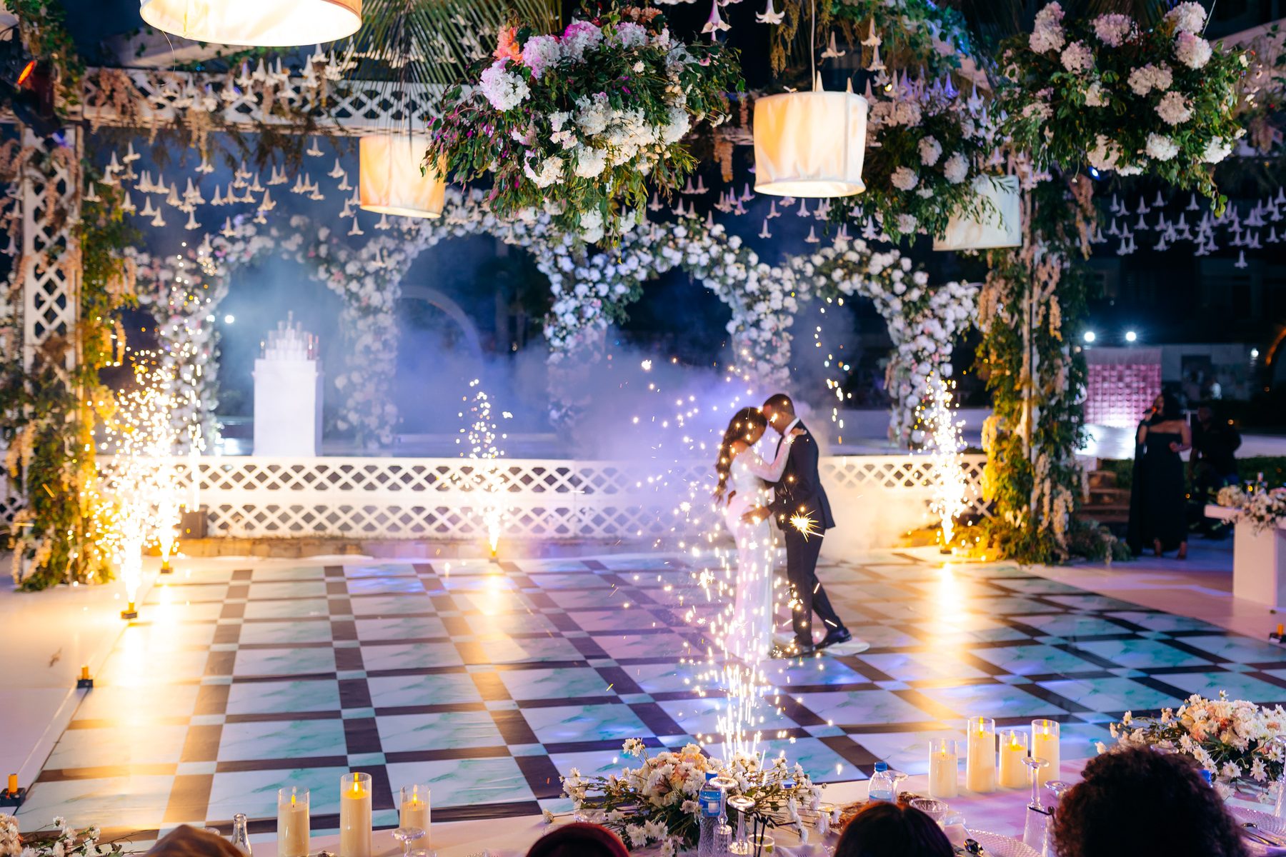 Ali & Dr. Lucy wedding in Tanga, Tanzania, by Kevins Events — first dance amid sparklers and mist