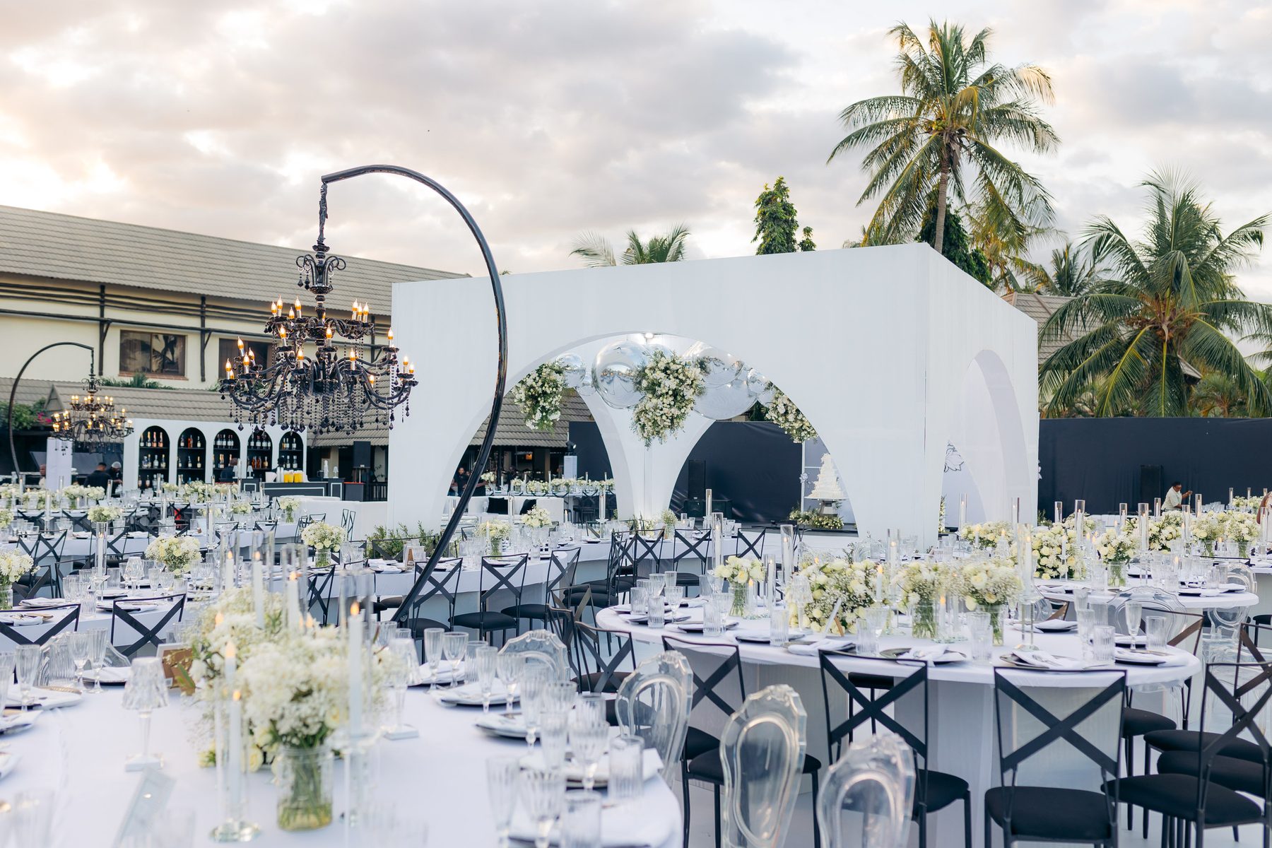 Anthony & Irene wedding at White Sands Resort, Dar es Salaam, by Kevins Events — monochrome tablescapes and the wedding cake