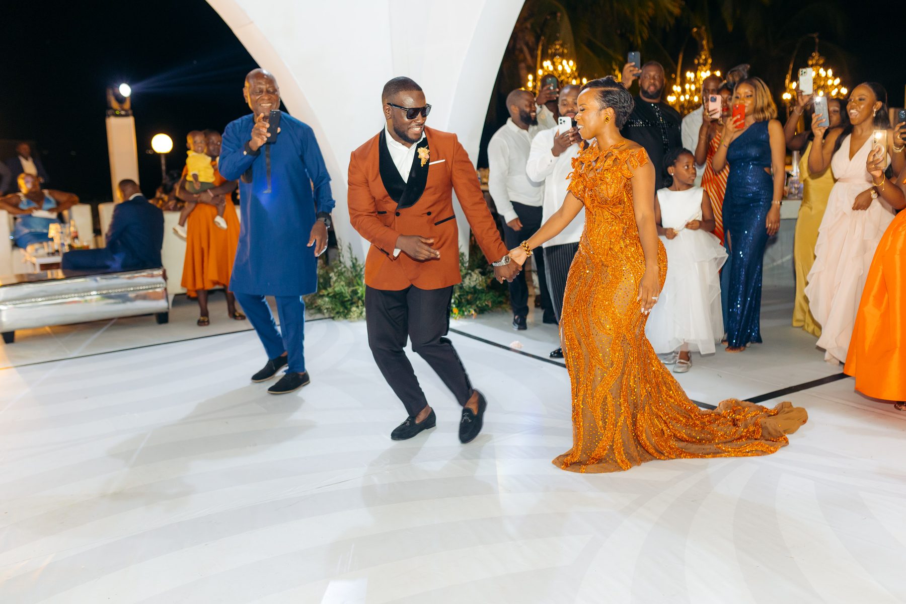 Anthony & Irene wedding at White Sands Resort, Dar es Salaam, by Kevins Events — a lively reception entrance