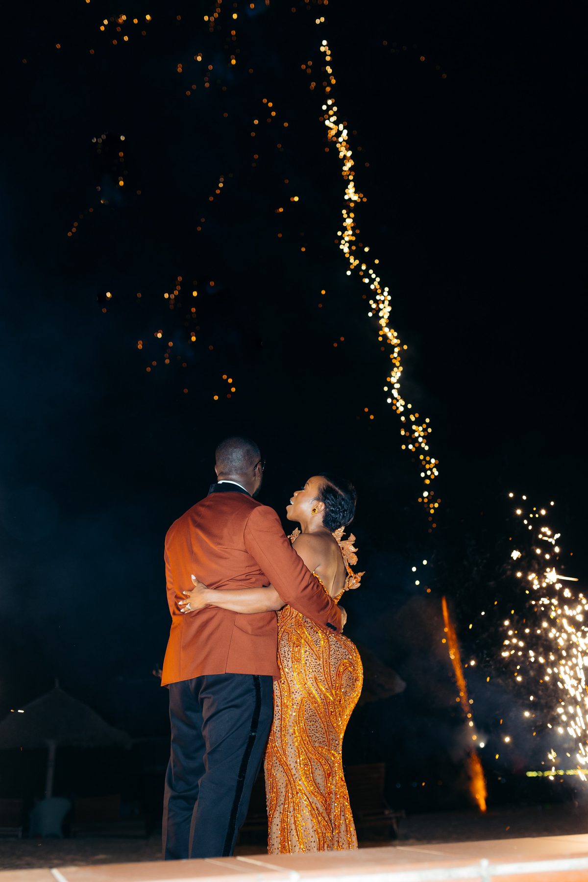 Anthony & Irene wedding at White Sands Resort, Dar es Salaam, by Kevins Events — fireworks over the oceanfront celebration