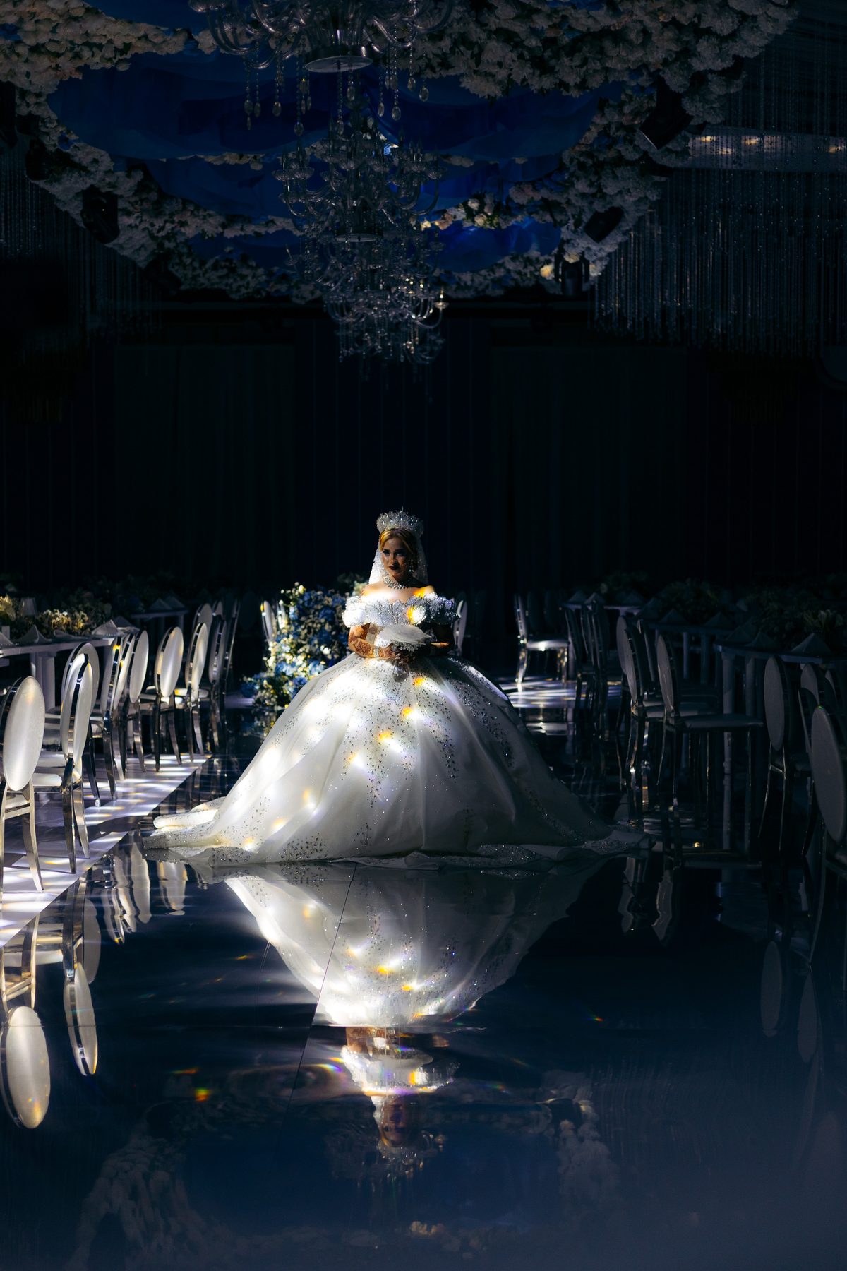 Hamis & Sabrina wedding at Johari Rotana — bridal portrait in the spotlight — by Kevins Events