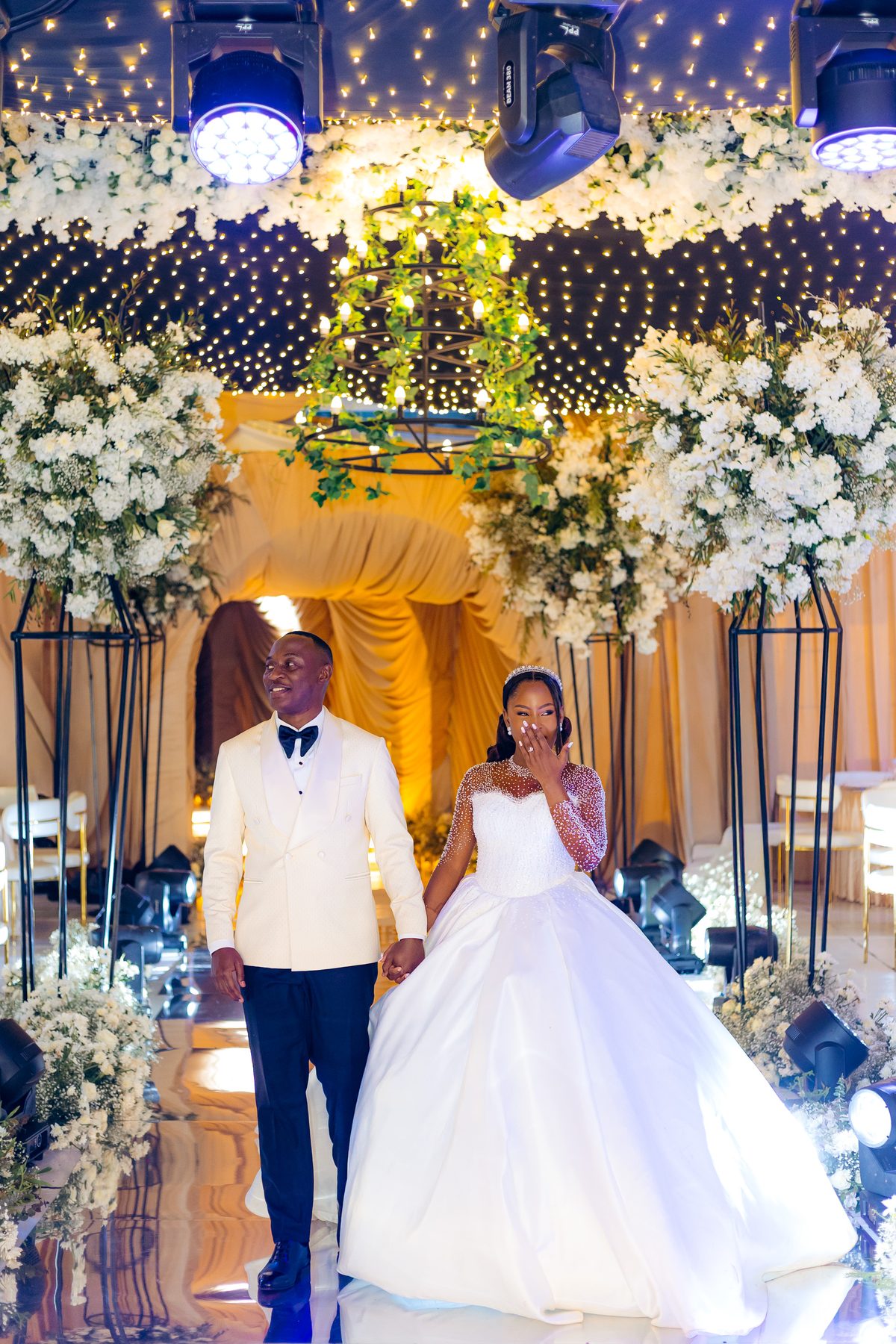 Jordan & Doria wedding at Serena Hotel, Dar es Salaam, by Kevins Events — the couple's grand entrance