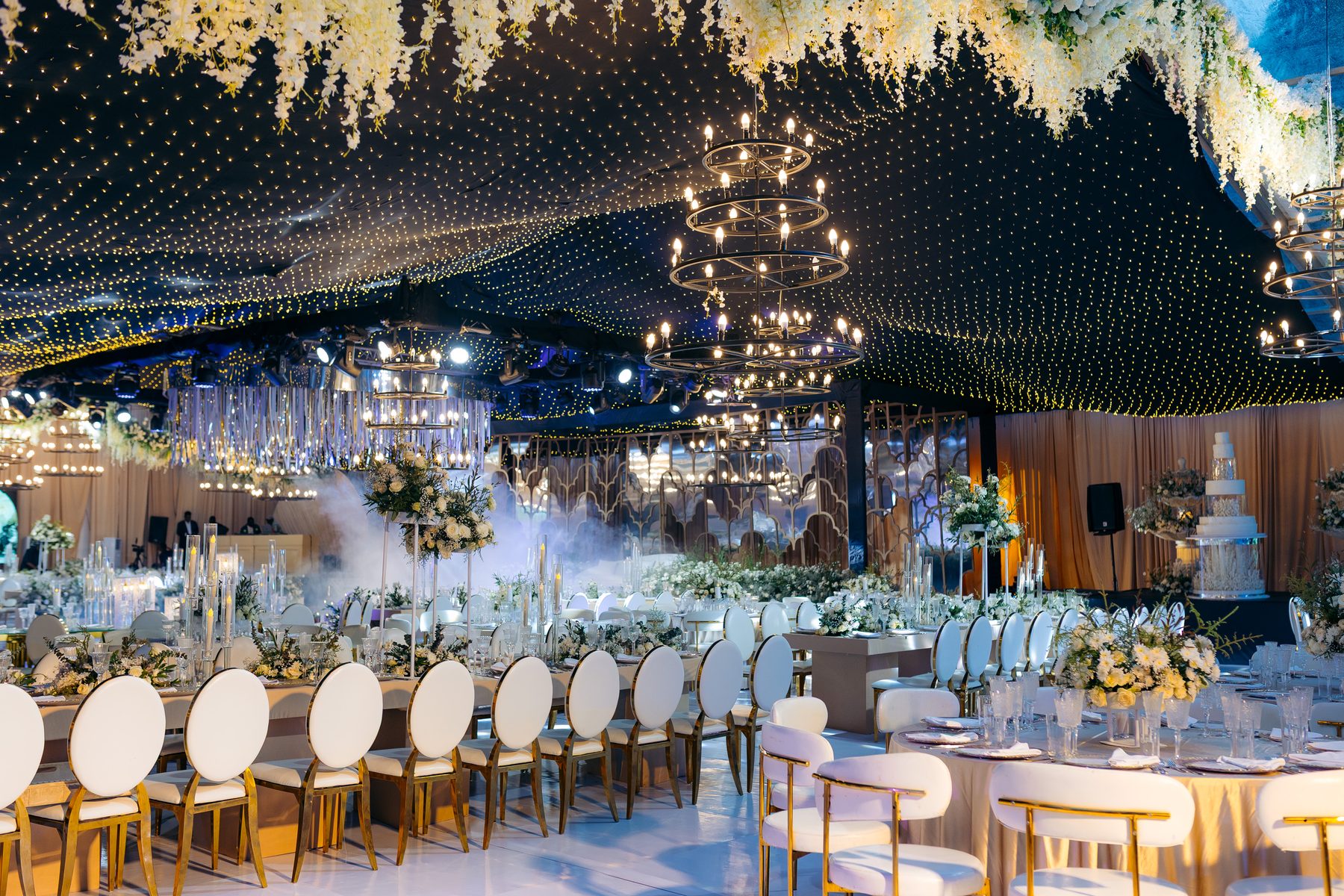 Jordan & Doria wedding at Serena Hotel, Dar es Salaam, by Kevins Events — wide reception with gold chairs and chandeliers