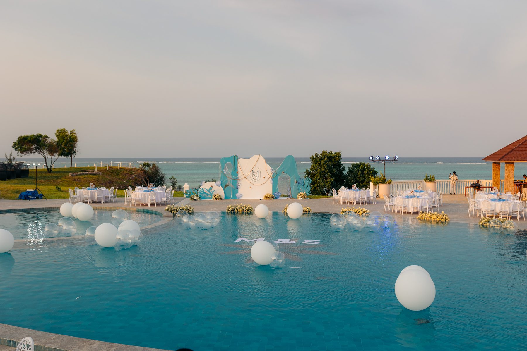 Sonia & Miraj wedding in Zanzibar — under the sea monogram — by Kevins Events