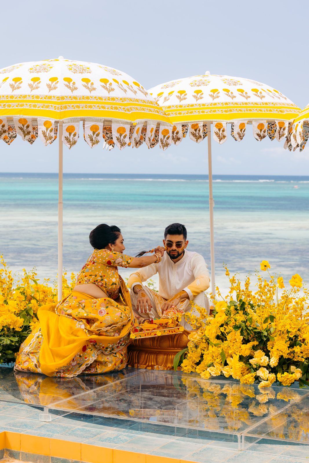 Sonia & Miraj wedding in Zanzibar — the haldi ceremony by the ocean — by Kevins Events