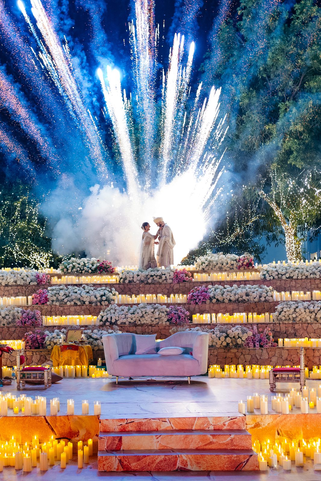 Sonia & Miraj wedding in Zanzibar — the couple framed by fireworks — by Kevins Events