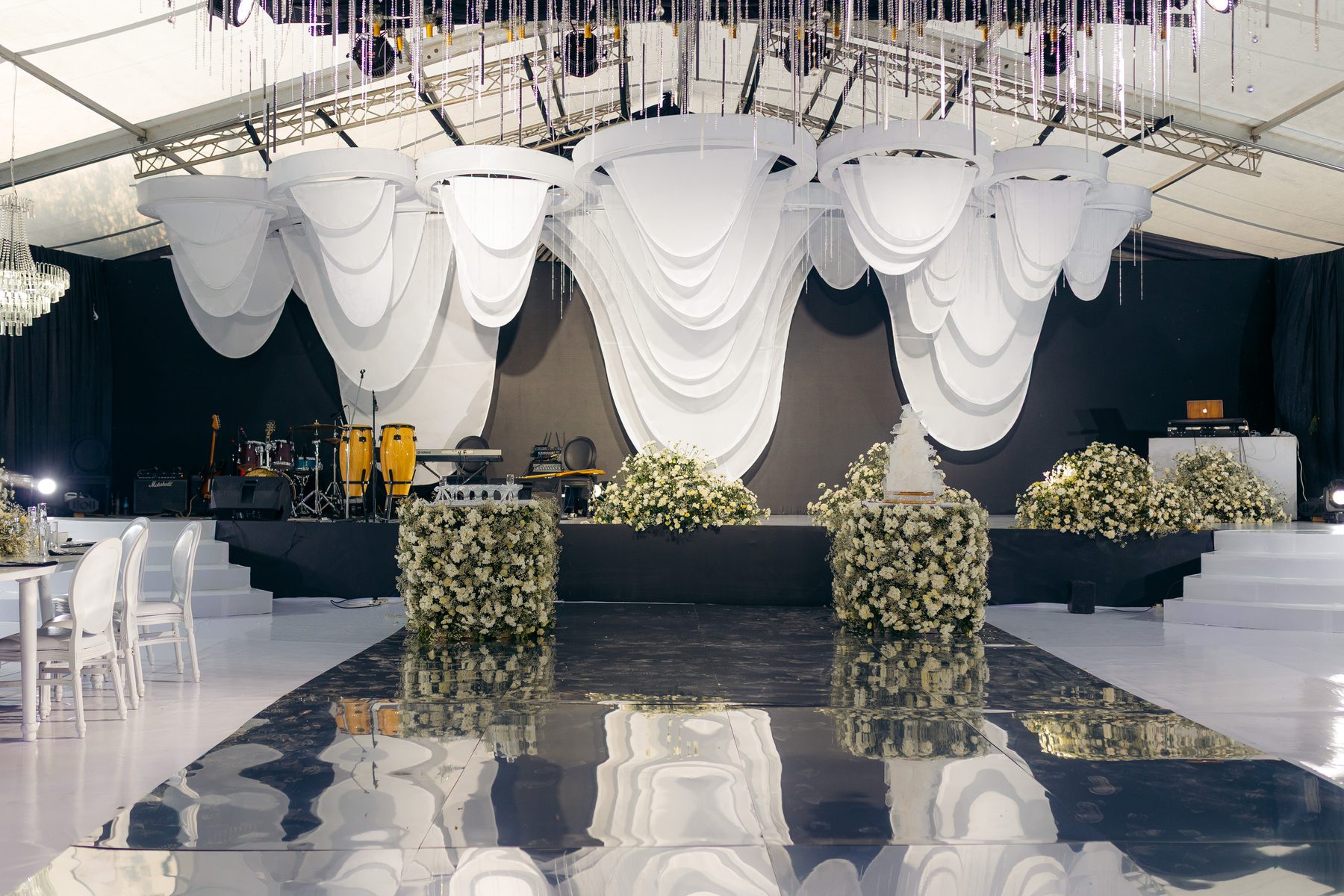 With Love, Bea — Beatrice's celebration at Kili Seasons, Arusha, by Kevins Events — the sculptural draped stage