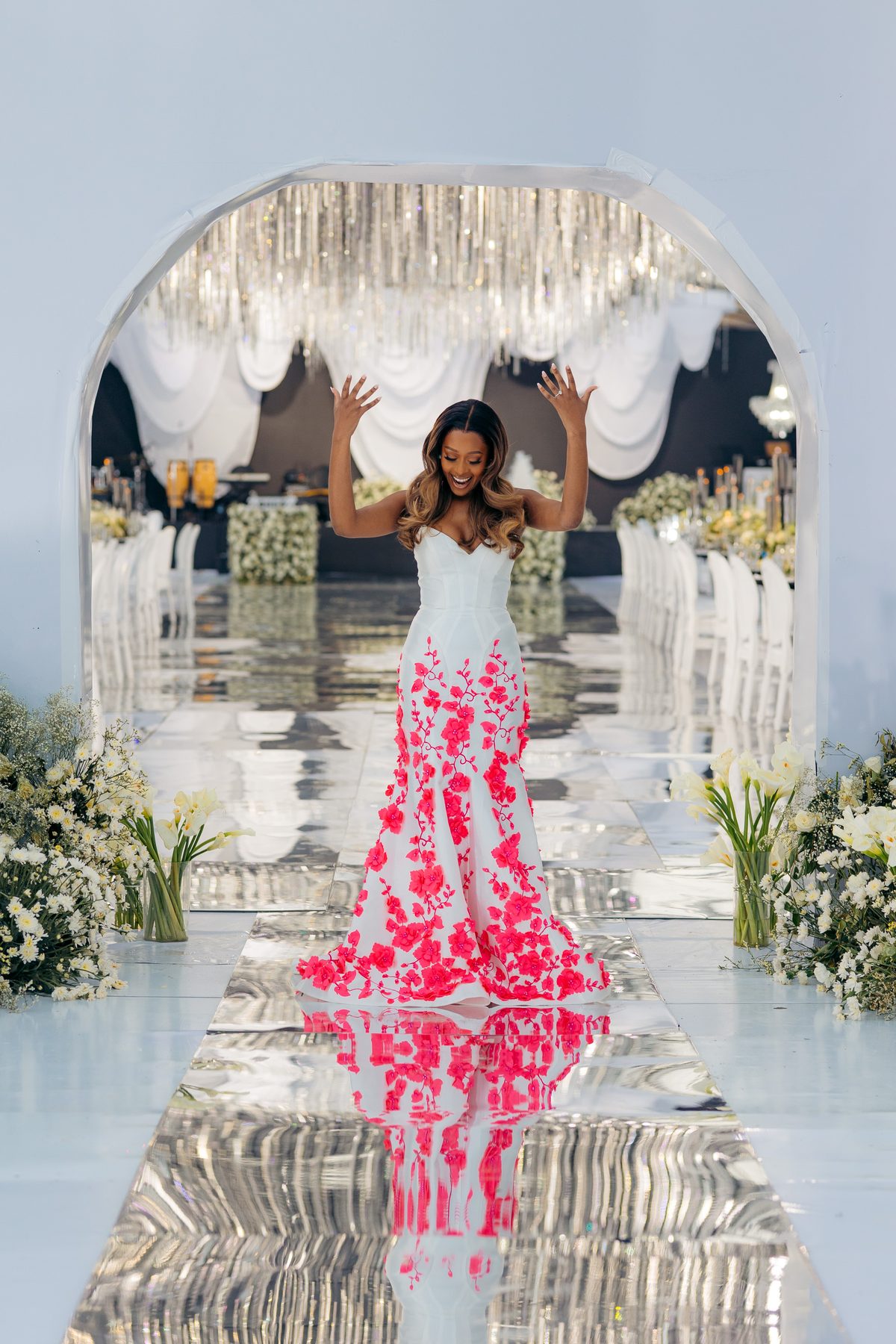 With Love, Bea — Beatrice beneath the crystal archway at Kili Seasons, Arusha, by Kevins Events