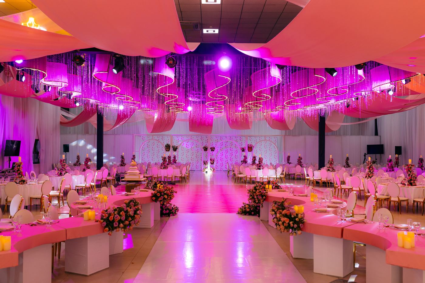 Wide view of pink and gold wedding reception — Kevins Events Tanzania