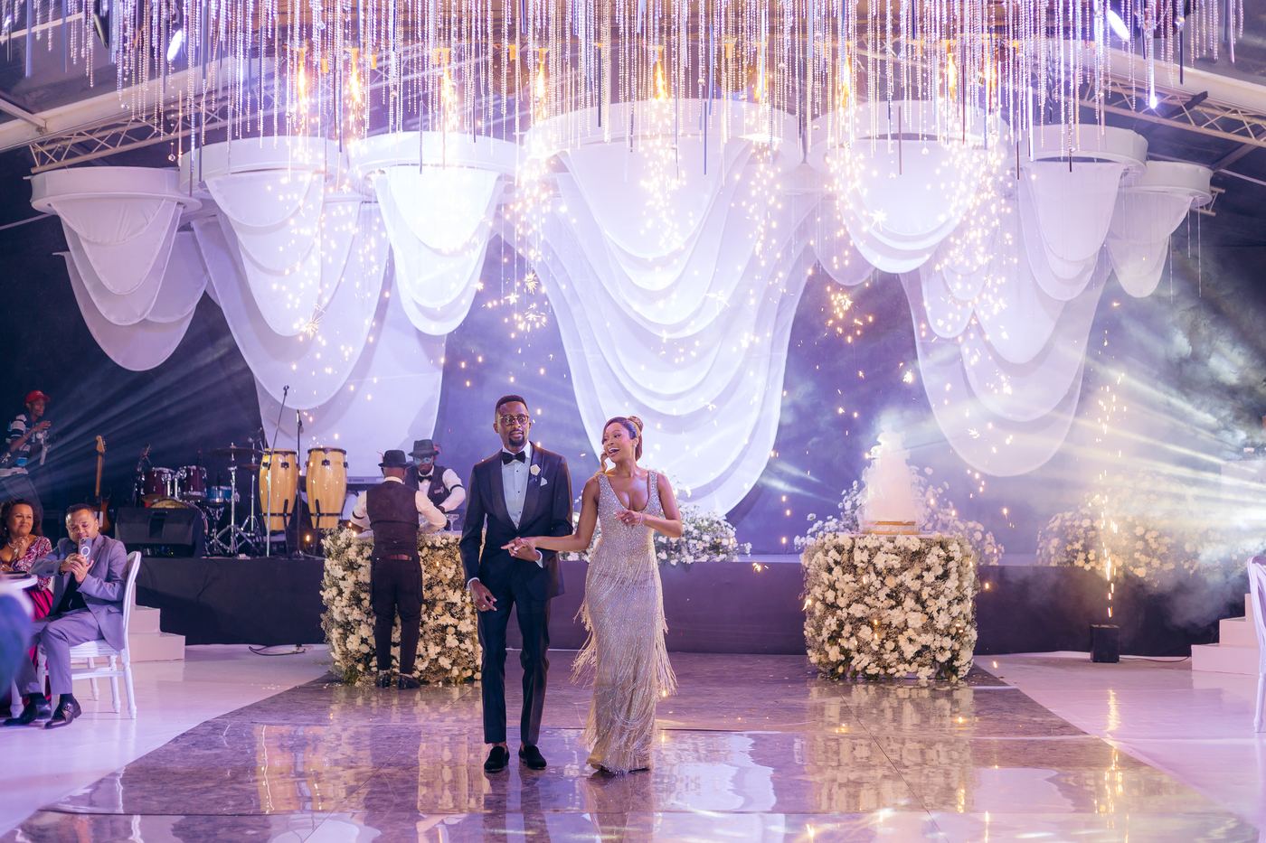 Couple first dance under crystal ceiling with live band — luxury wedding by Kevins Events Tanzania